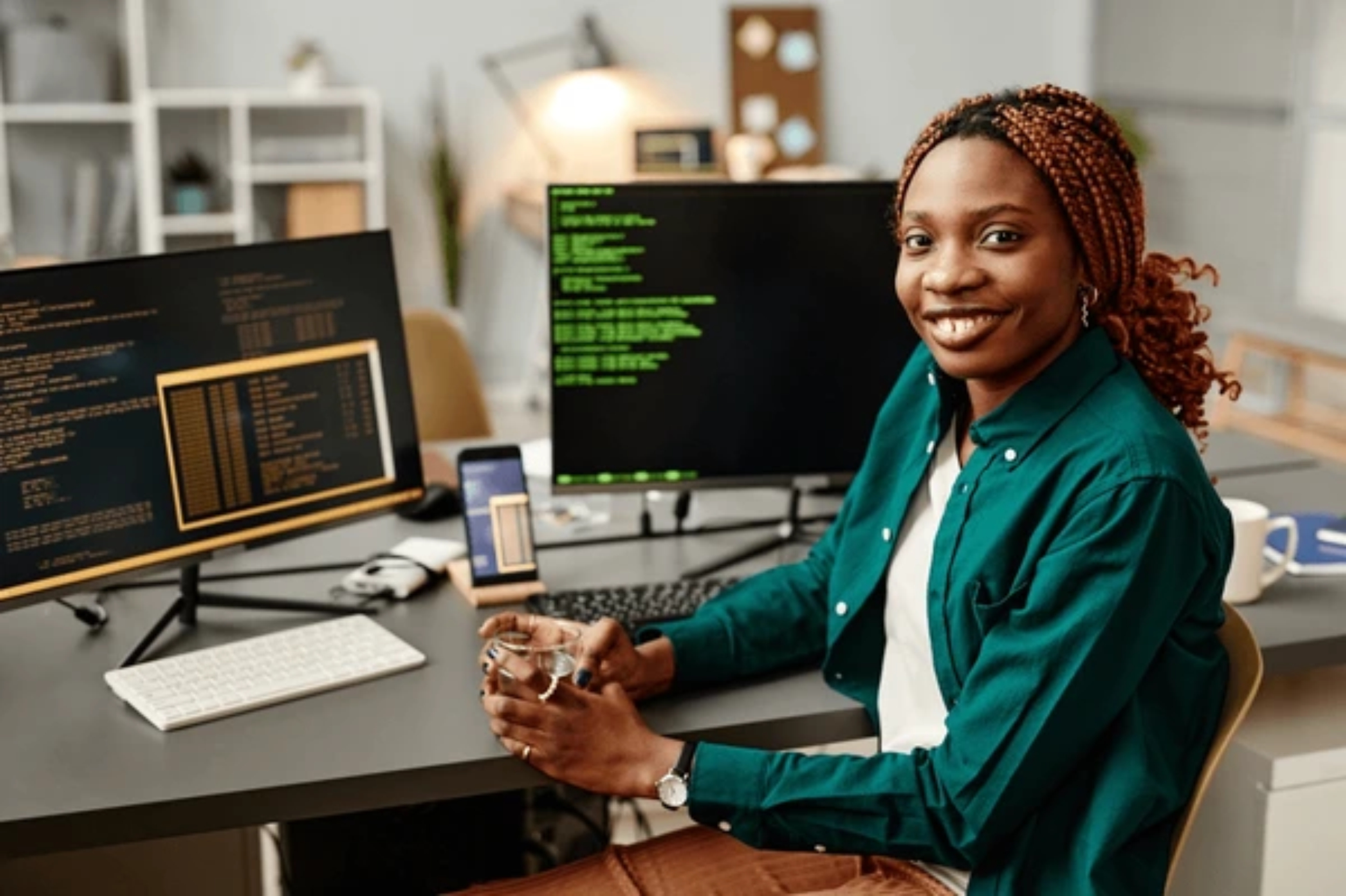 Young man coding on laptop